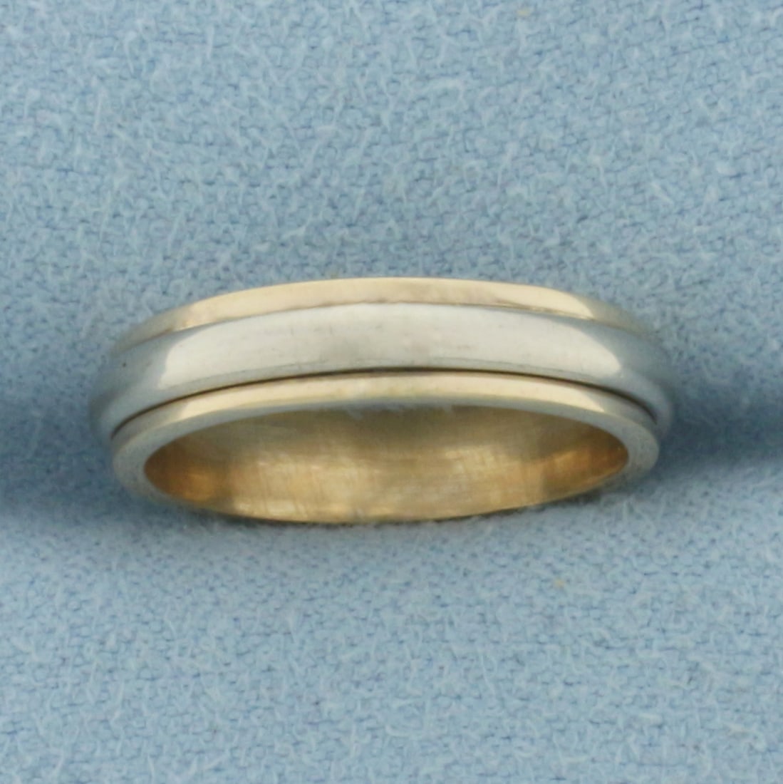 Two-Tone Banded Pinky Ring in 14k Yellow and White Gold: In 14k Yellow and White Gold. 4.1mm wide. Size 4. 3.8g.