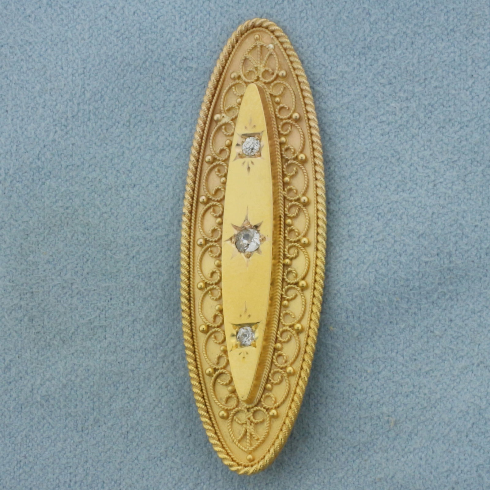 Antique Victorian Old Mine Cut Diamond Pendant in 15k Yellow Gold: In 15k yellow gold. British made. 2 7/8 inches long by 5/8 inch wide. Contains one .1ct and two .05ct high quality Old European cut diamonds, VS clarity/H color. Rope twist wirework and gold bead deta