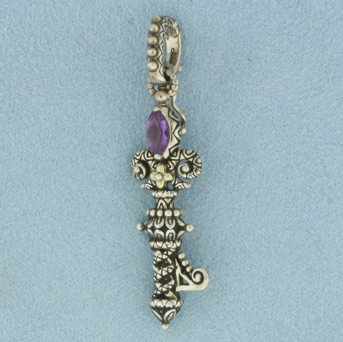 Barbara Bixby Amethyst Hinged Key Pendant in 18K Yellow Gold and Sterling Silver: In .925 sterling silver and 18k yellow gold. 2 inches long. Contains one 7.5mm high quality natural marquise cut Amethyst gemstone. Hinged bail with safety latch. 6.2g.