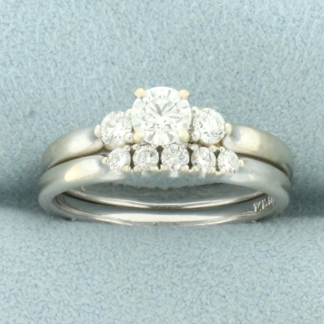 Diamond 3-Stone Engagement Ring and Matching Wedding Band Bridal Set in 14k White Gold: In 14k white gold. Contains one .35ct diamond, SI2 clarity/F color, eye clean, great cut for lots of sparkle. Also contains 2 high quality .1ct diamonds of similar high quality. Band contains 5 high q