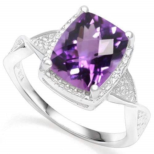 Amethyst and Diamond Ring in Sterling Silver: In platinum over .925 sterling silver. Contains one amethyst, 2.65cts, accented with two genuine diamonds, .01ctw. Size 7. 3.2g
