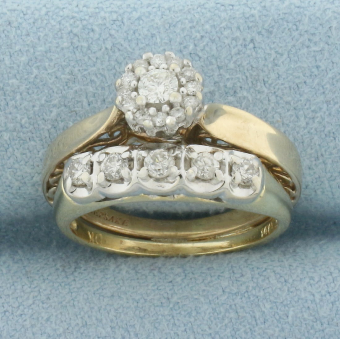Diamond Engagement and Wedding Ring Bridal Set in 14k and 10k Yellow Gold: In 14k and 10k Yellow Gold. Contains one .08ct, two .02ct, and twelve .01ct high quality round brilliant diamonds, H color/I clarity. Rings are soldered together. Size 5. 5.2g.