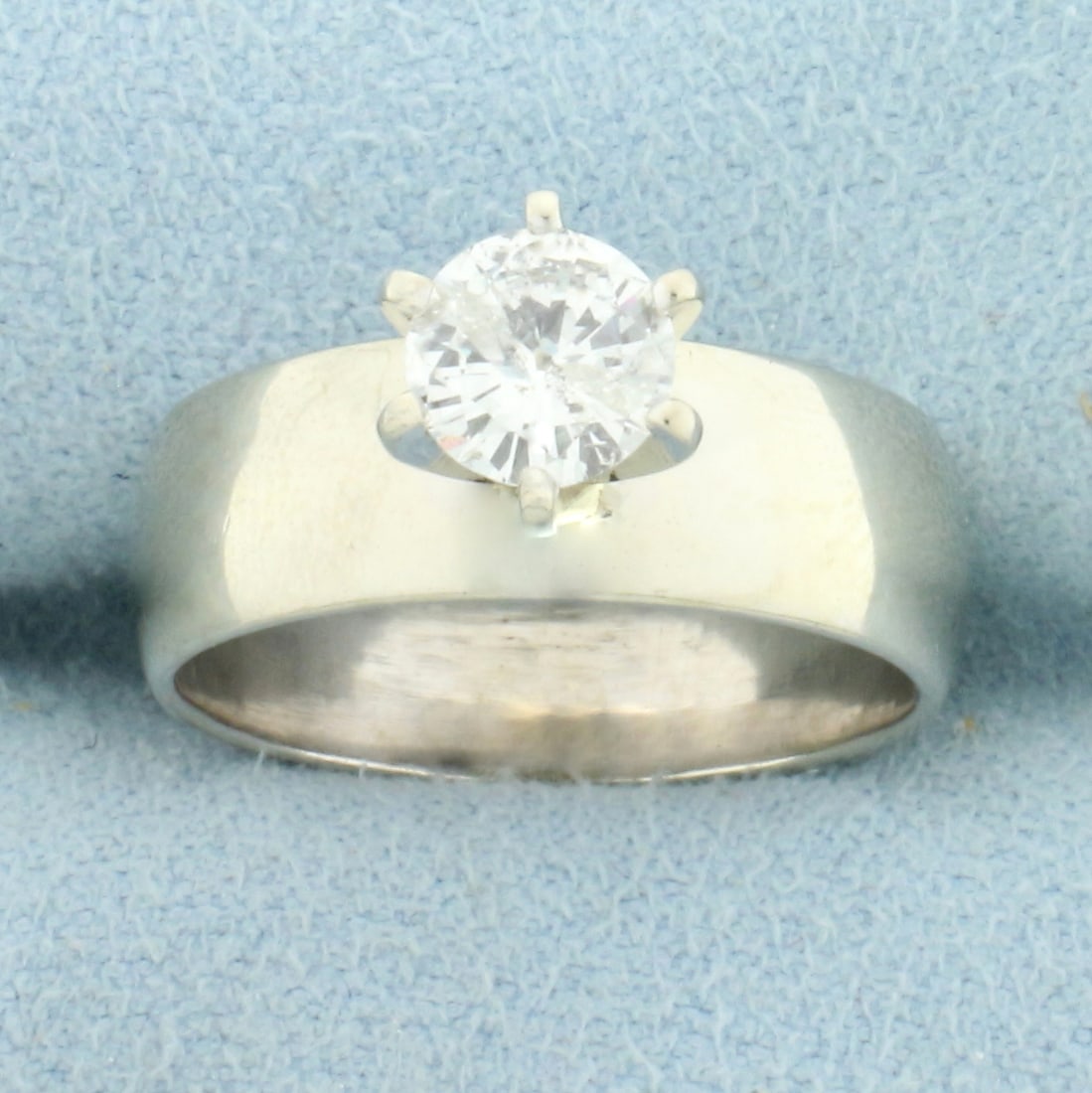 Diamond Solitaire Engagement Ring in 14k White Gold: In 14k white gold. Contain One .8ct round brilliant diamond G color/I clarity, great cut for lots of sparkle. Band measures 6.4mm wide. Size 7. 5.8g.