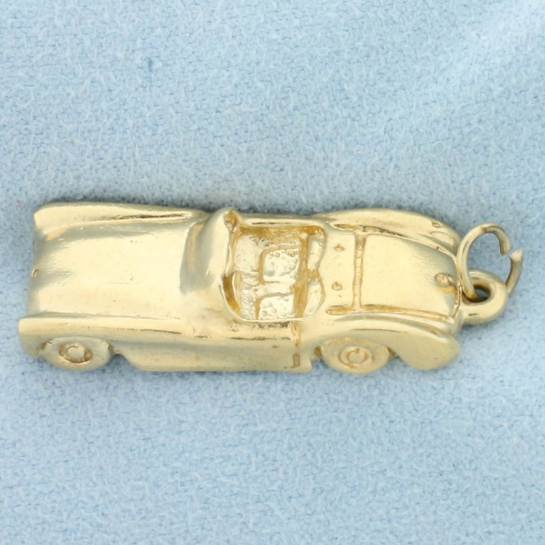 Vintage Convertible Car Pendant or Charm in 14k Yellow Gold: 14k yellow gold. 1 3/8 inches long, 1/2 inch wide. 5.6g.