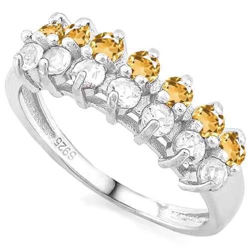 Yellow and White Sapphire Double Row Ring in Sterling Silver: In platinum over .925 sterling silver. Contains 7 yellow sapphires, 1/2ctw, and 7 white sapphires, 1/2ctw. Size 7. 2.3g