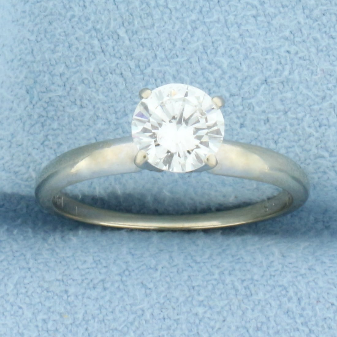 EGL Certified Solitaire Diamond Engagement Ring in 14K White Gold: In 14K White Gold. Contains one high quality .63ct round brilliant Certified Diamond, G/H color, SI1 clarity. Note diamond is correct in certification but was mounted in a different setting than on ce