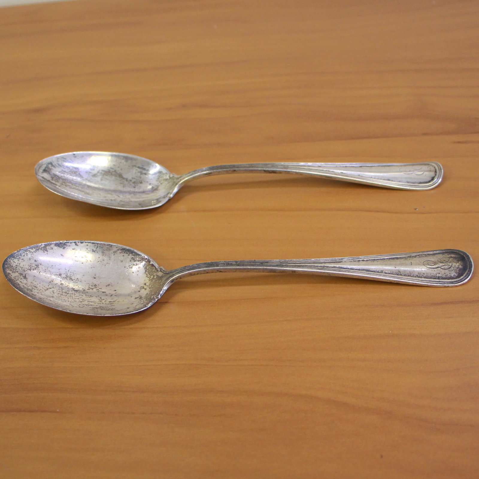 Set Of Two Watson Sterling Silver Serving Spoons: .925 sterling silver. 8 3/8 inches long. Faint "P" monogram. 119.9g.
