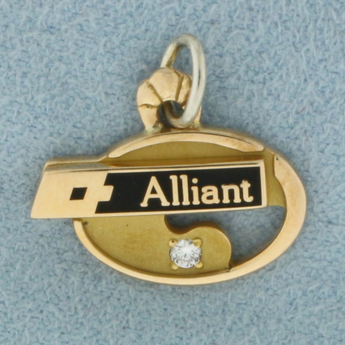 Vintage Alliant Diamond Charm in 10k Yellow Gold: In 10k Yellow Gold. Contains one high quality .02ct diamond. 5/8 inch tall including bail. 5/8 inch wide. 2.3g.