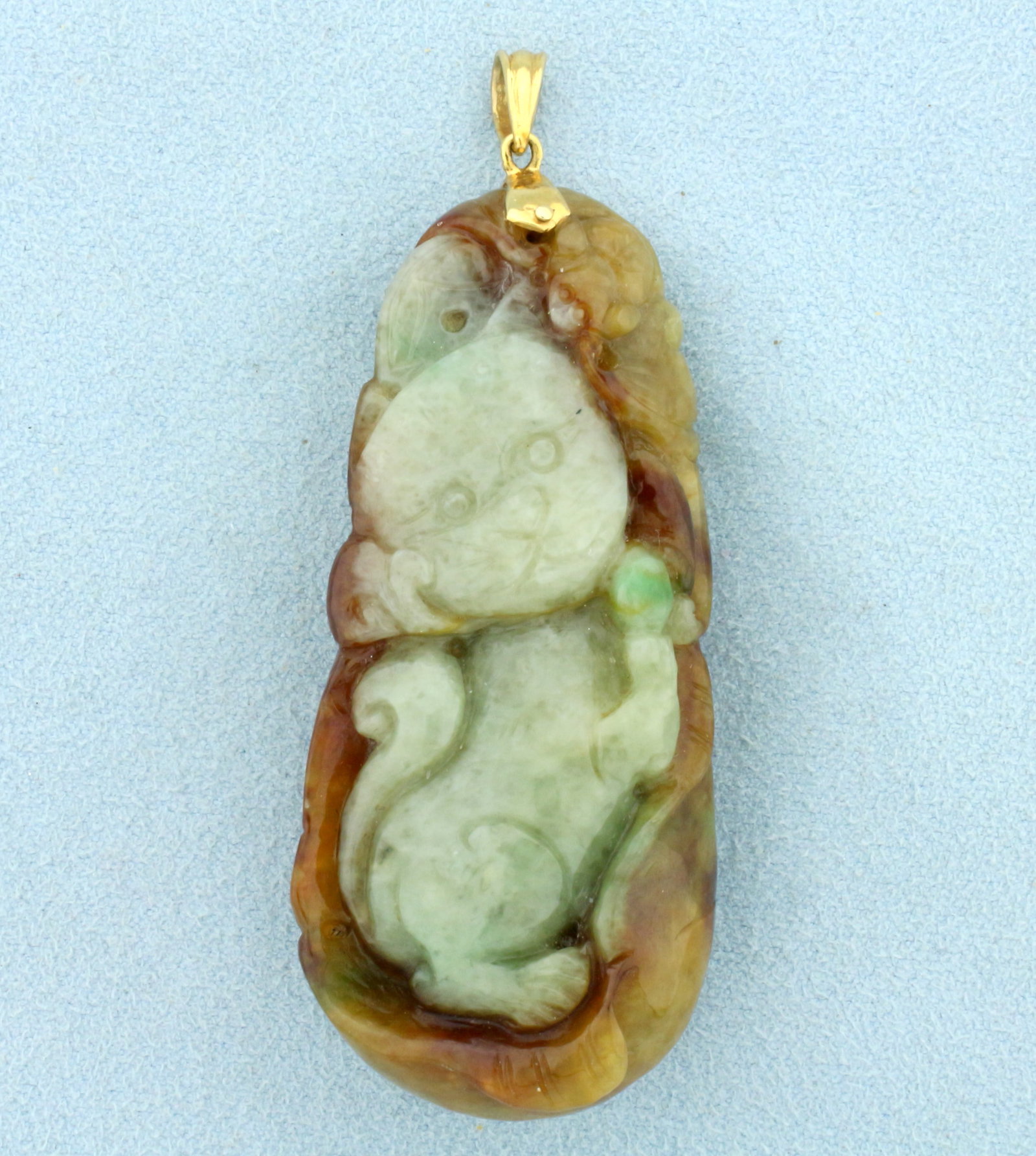 Vintage Chinese Hand Carved Jade Cat Pendant in 14K Yellow Gold: In 14K Yellow Gold. 2 5/8 inches long including bale. 1 inch wide. 47.9g