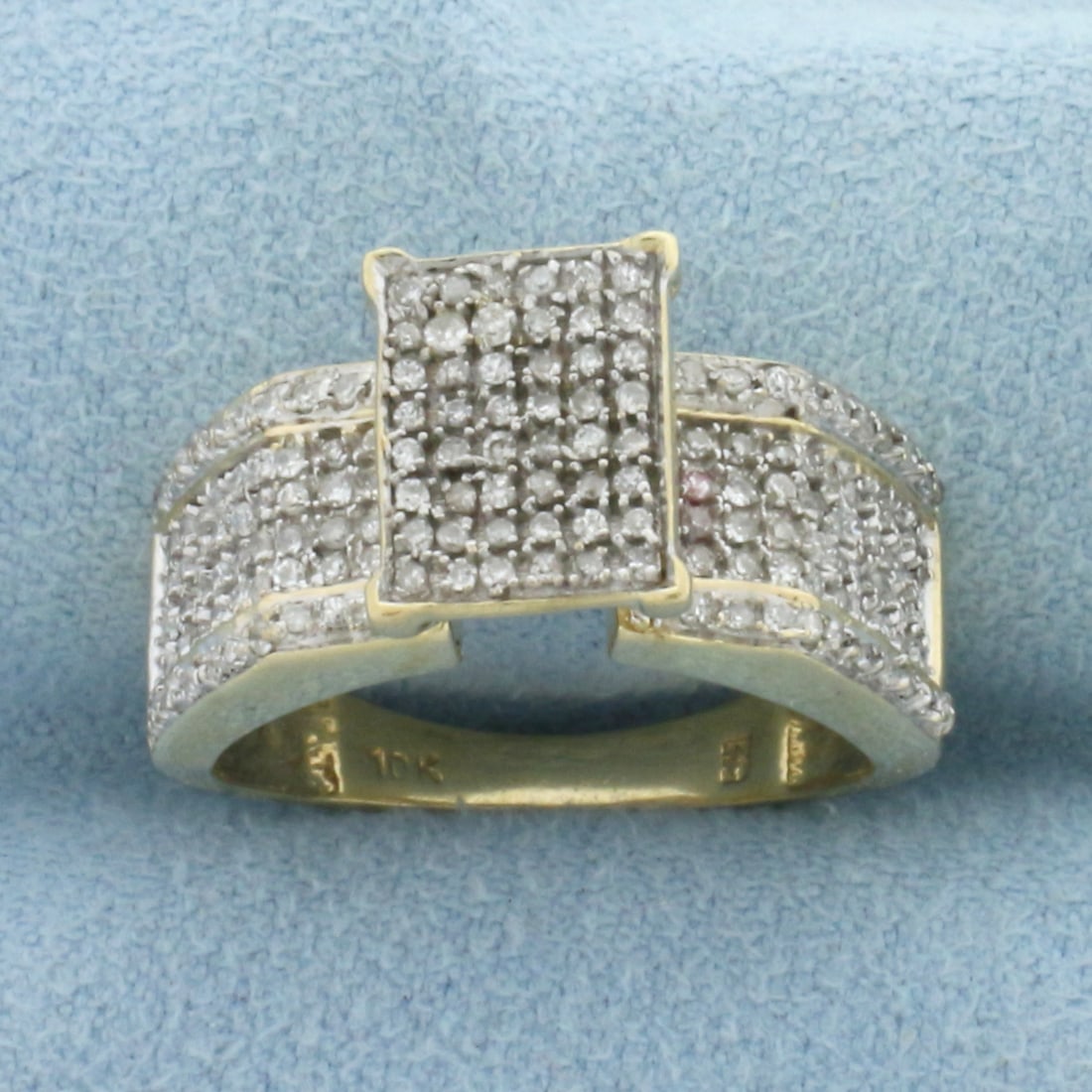 Diamond Pave Ring in 10K Yellow Gold: In 10k yellow gold. 10.3mm wide at top of ring. Contains 172 high quality 1/2pt diamonds. Size 7.5. 4.9g.