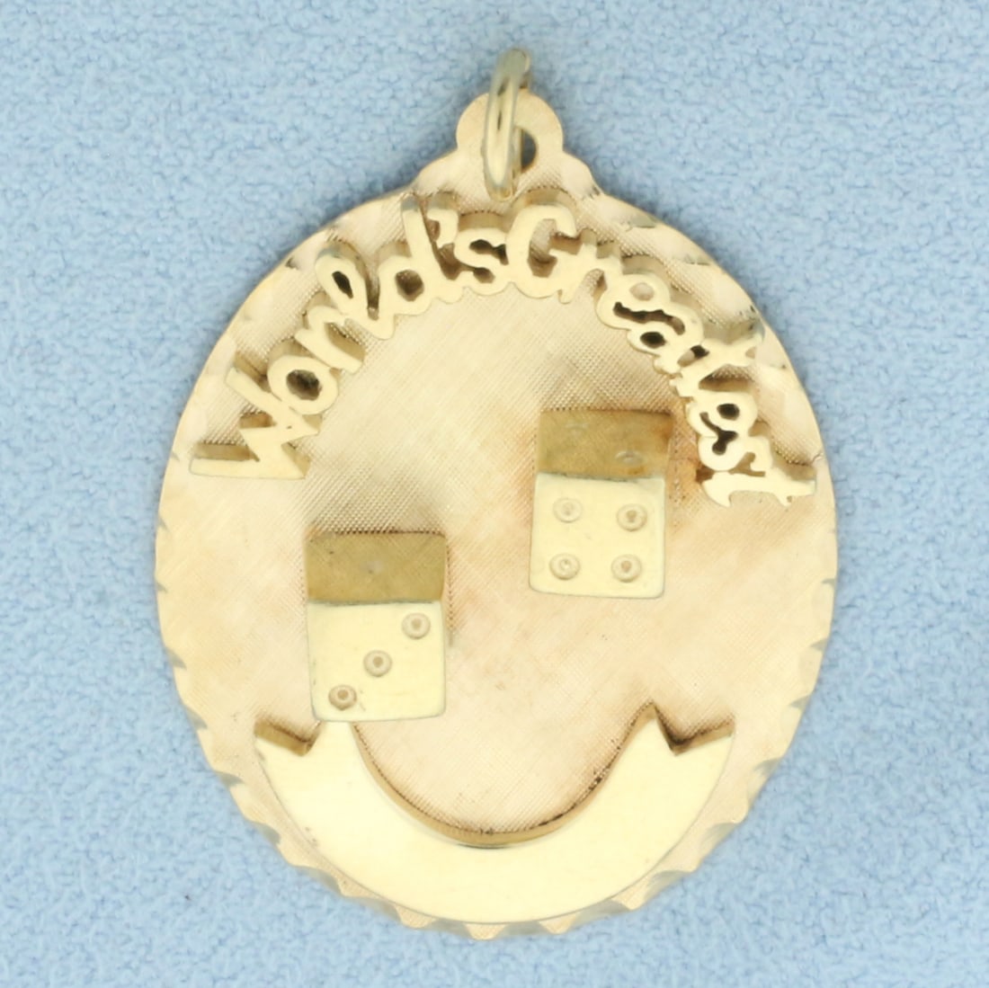 World's Greatest 3-D Dice Pendant or Charm in 14k Yellow Gold: In 14k yellow gold. Engravable on back. 1.5 inches long (including jump ring) and 1 inch wide. 8.2g.