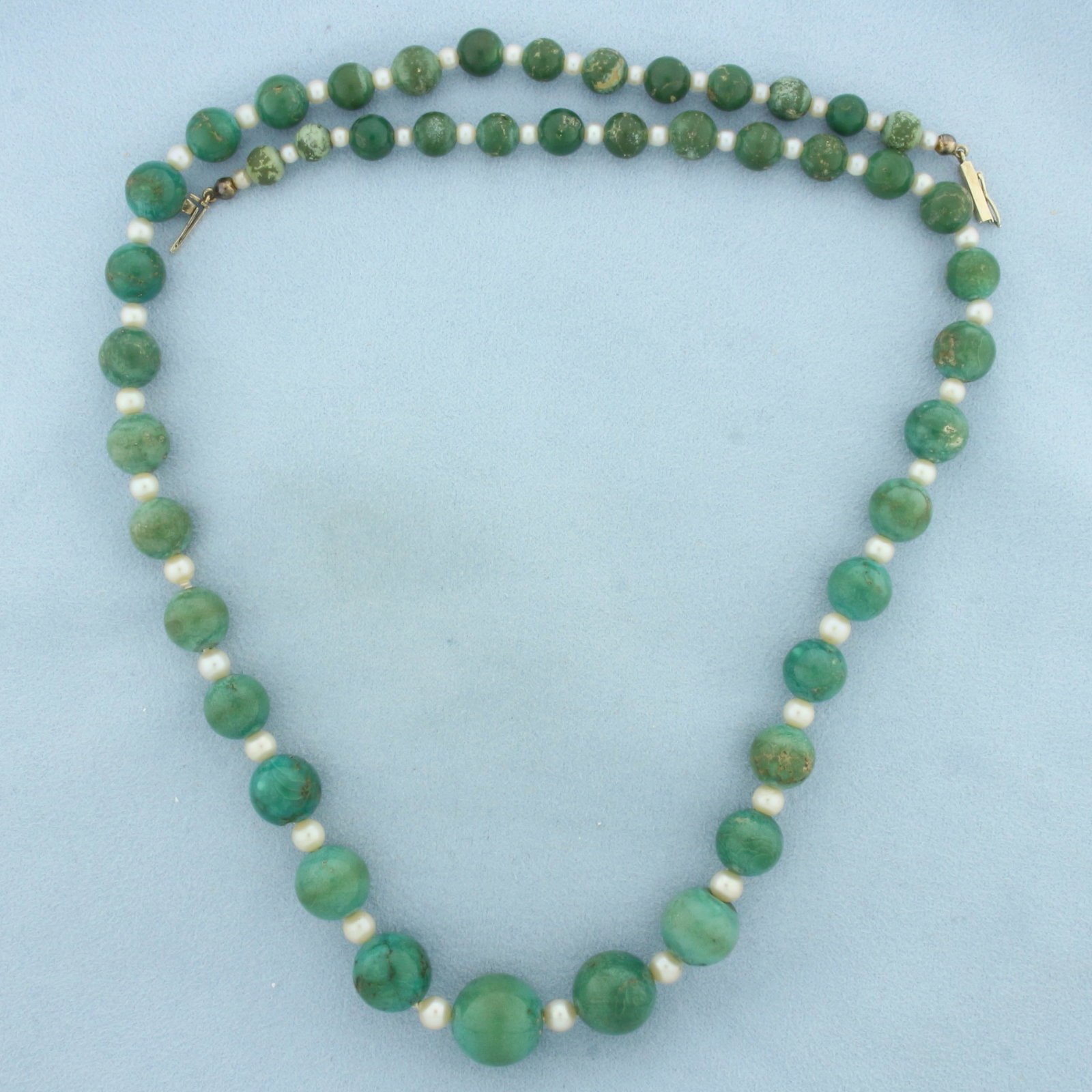 Vintage Green Turquoise and Cultured Pearl Necklace in 14K Yellow Gold: 14k yellow gold clasp. 23 inches long. Contains Green Turquoise polished gem beads, 6.5-15mm each, with deep forest green color. Also contains 5mm Cultured Pearls with high luster. Barrel clasp with s