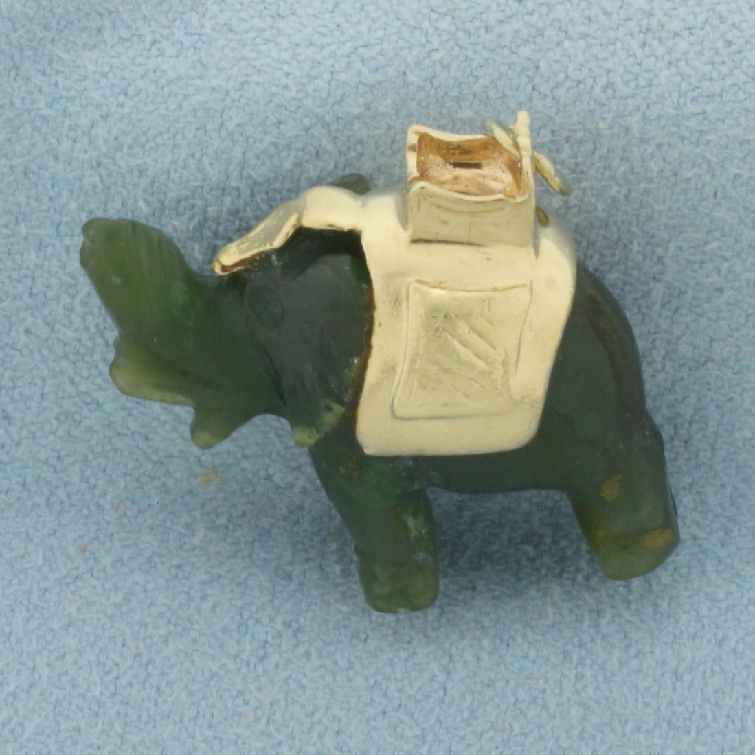 Vintage Jade Elephant Charm in 14k Yellow Gold: In 14k yellow gold. 7/8 inch long by 7/8 inch wide. Hand carved high quality Jade gemstone. 7.6g.