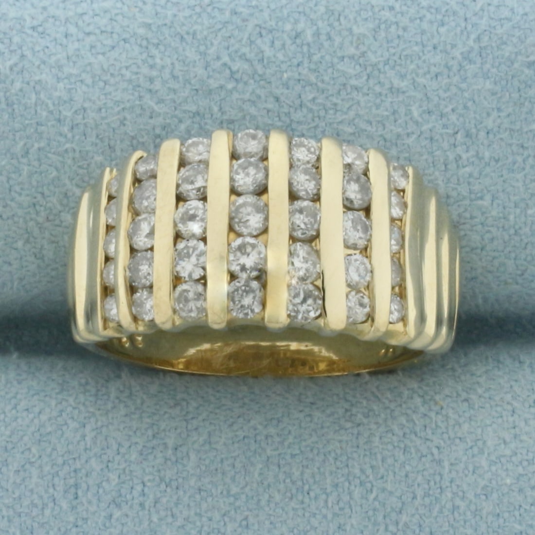Channel Set Diamond Vertical Bar Ring in 14K Yellow Gold: In 14k yellow gold. 11mm wide at top of ring. Contains 35 high quality diamonds, 1.25ct TW, H color/I clarity. Size 7. 5.7g.