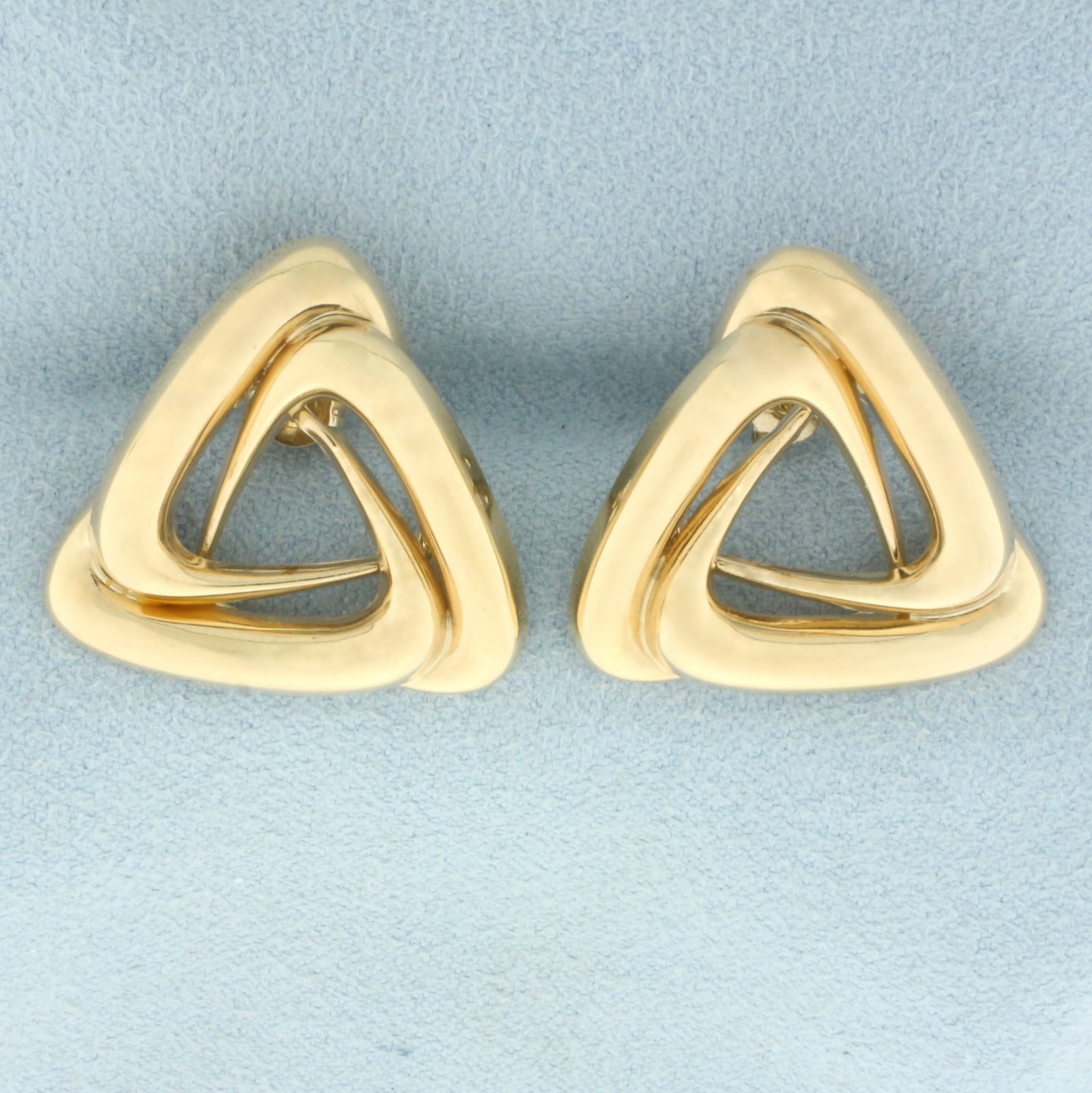 Triangle Knot Earrings in 10k Yellow Gold: In 10k Yellow Gold. 1 inch long. 1 inch wide. Friction backs. 3.2g.