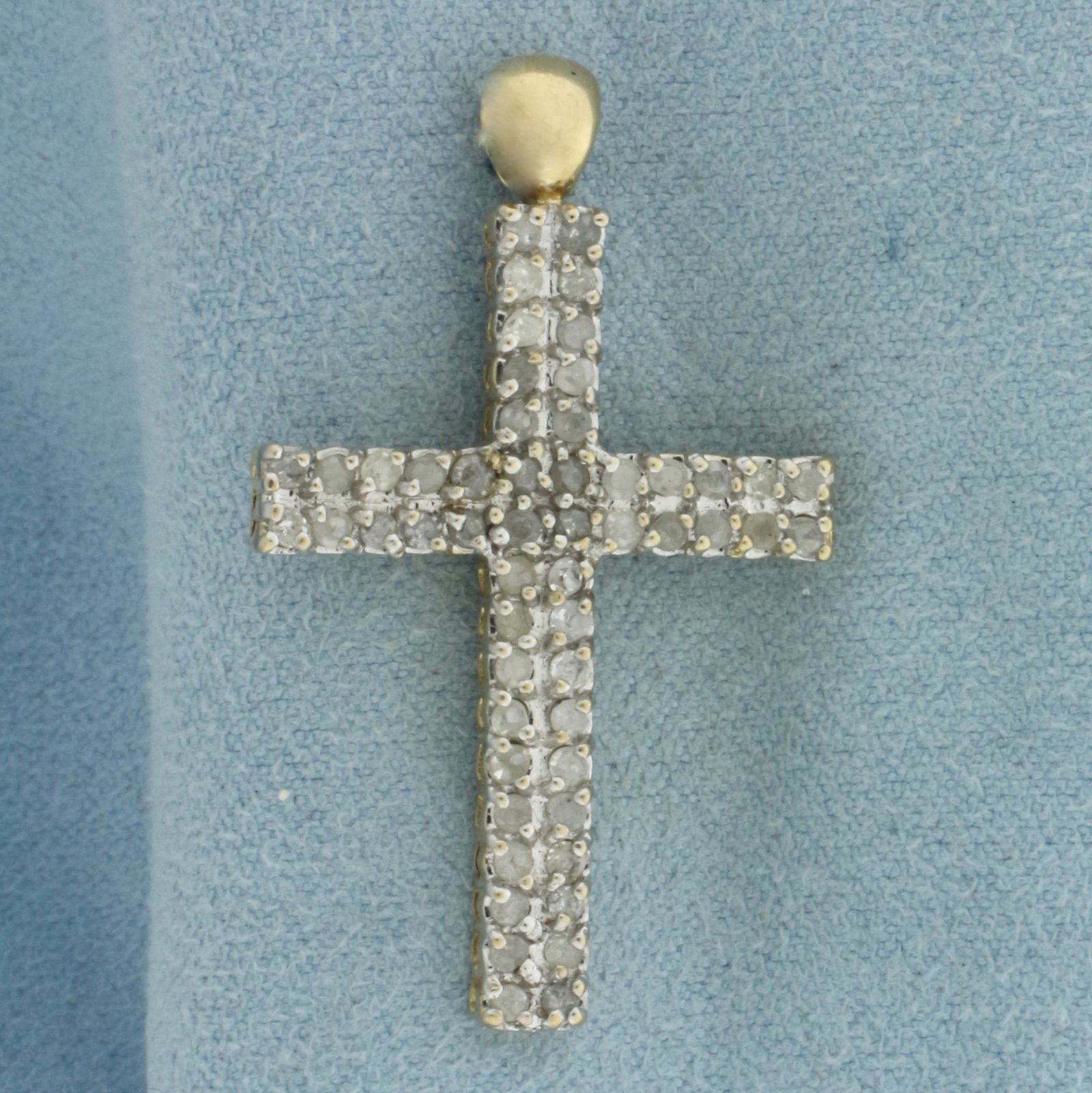 Diamond Cross Pendant in 10K Yellow Gold: In 10k yellow gold. 1.5 inches long (including bail) by 7/8 inch wide. Contains 50 high quality diamonds, 1ct TW. 3.7g.