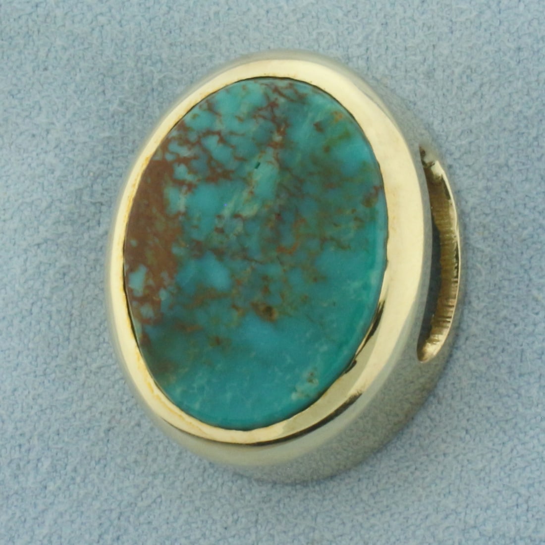 Turquoise Bezel Large Pendant in 10K Yellow Gold: In 10k yellow gold. 1 inch long by 3/4 inch wide. Contains 1high quality polished Turquoise gemstone, 21x16.5mm. 13.3g.