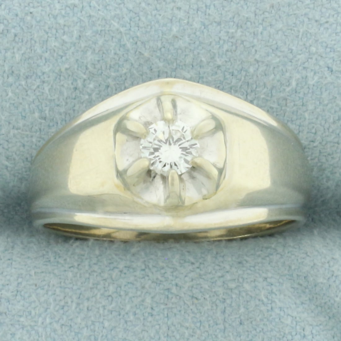 Diamond Solitaire Ring in 14k White Gold: In 14k white gold. Contains one high quality 1/3ct diamond, VS clarity/I color. Diamond has small chips on girdle, not noticeable. 11.4mm widest center of ring. Size: 9.