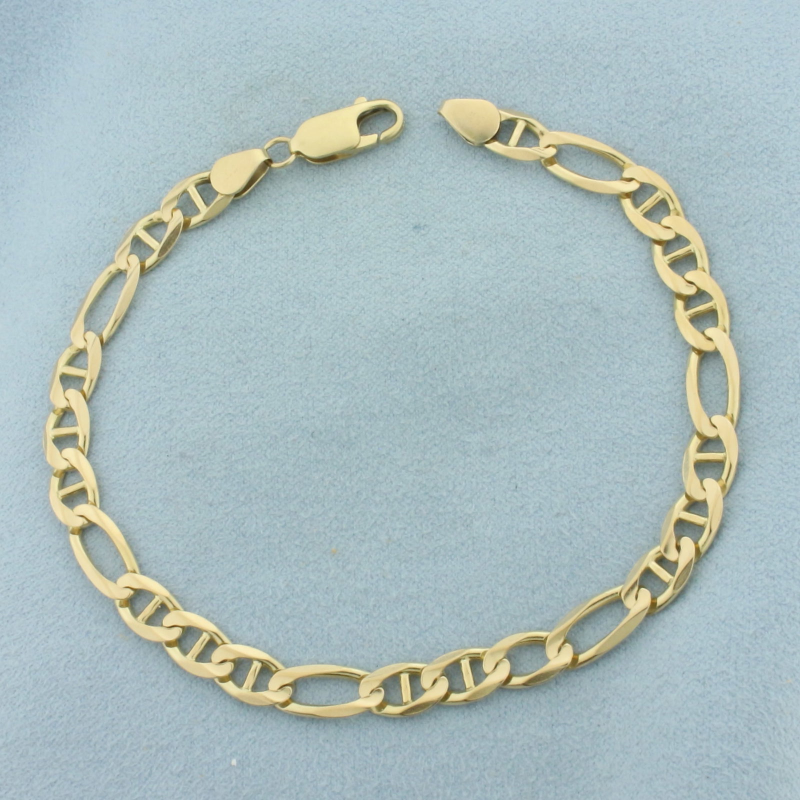 Mens Anchor Mariner Figaro Link Bracelet in 14K Yellow Gold: in 14k yellow gold. 8 5/8 inch long by 1/4 inch wide with lobster clasp. 10.1g.
