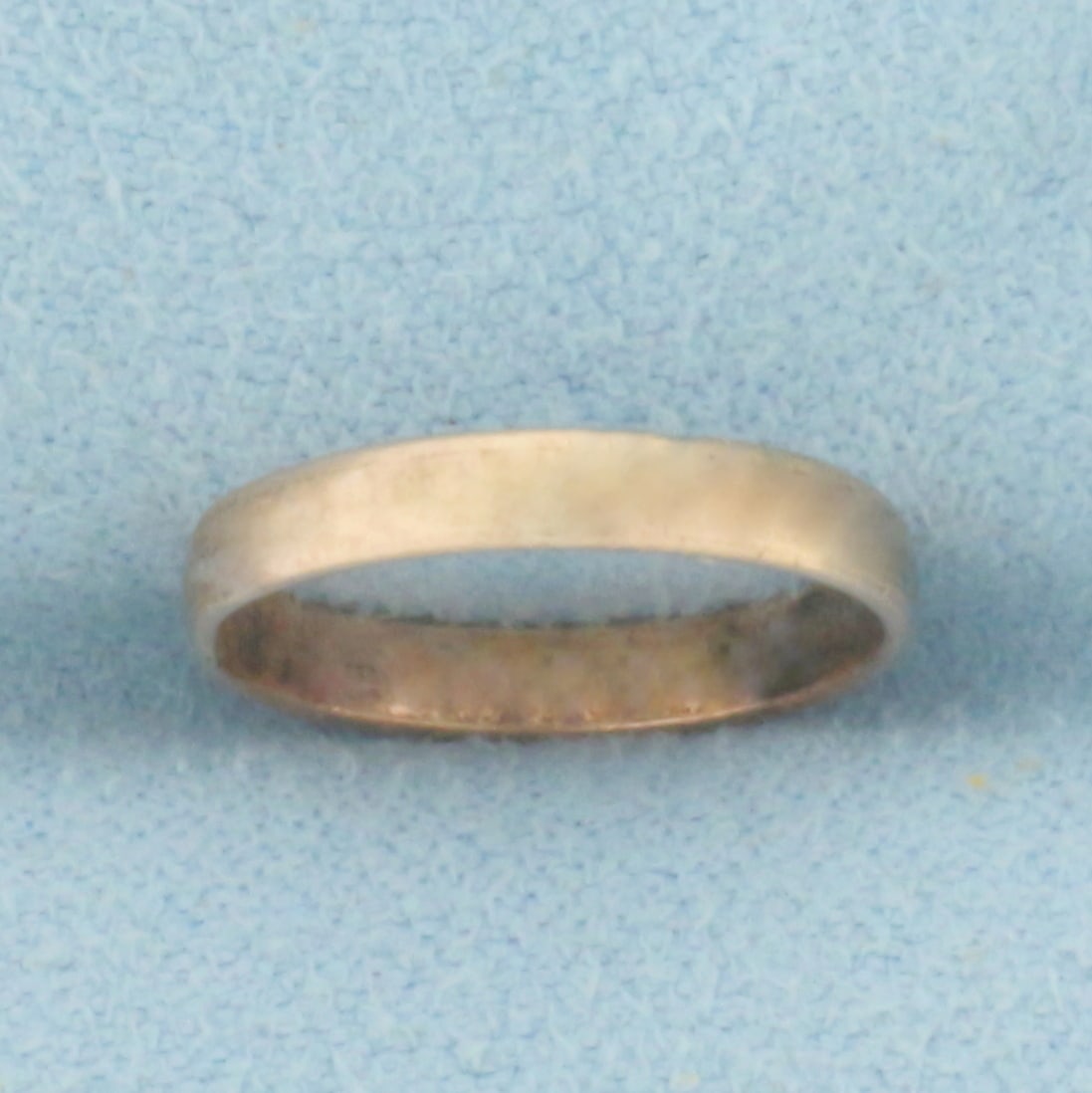 Antique Baby Ring in 10k Rose Gold: In 10k rose gold. 2.3mm wide, and size 1/2. 0.5g.