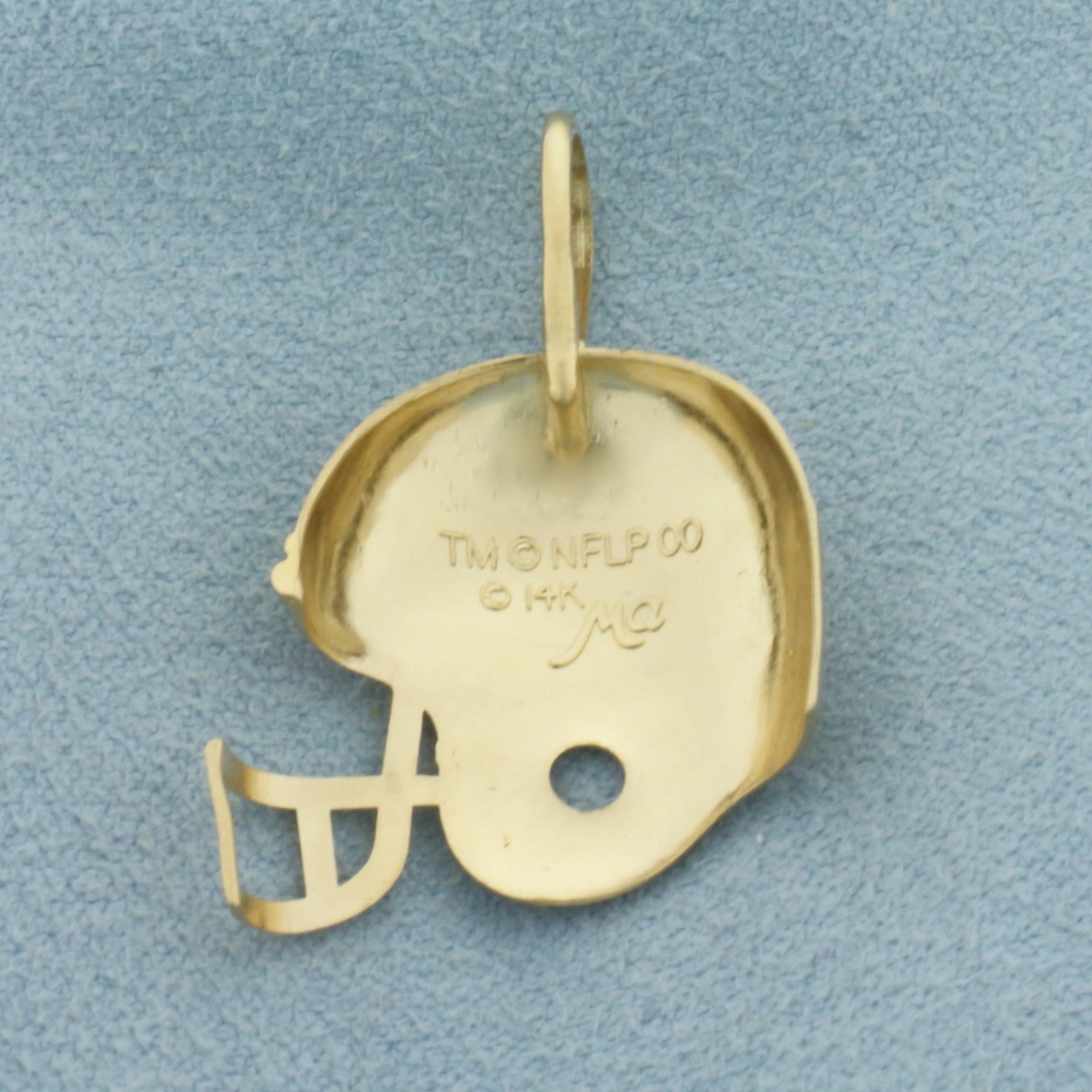 Vintage New England Patriots Football Helmet Pendant in 14k Yellow Gold: In 14k Yellow Gold. 1 1/4 inch long (including bale). 7/8 inch wide. Enamel details. 2.0g.