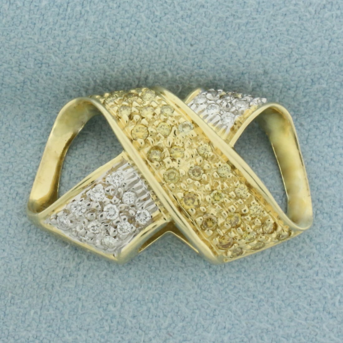 Fancy Yellow and White Diamond Pave Slide Pendant in 14K Yellow Gold: In 14k yellow gold. 1 inch wide by 5/8 inch high. Contains thirty high quality .02ct fancy yellow diamonds with intense yellow color and nineteen .02ct high quality "white" diamonds.