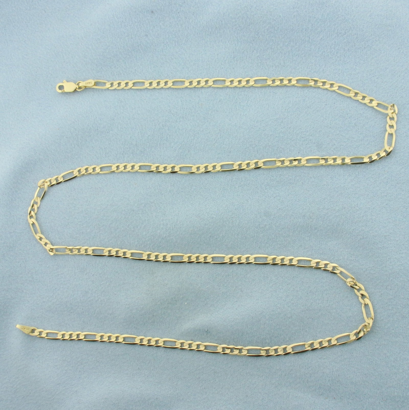 20 Inch Figaro Link Chain Necklace in 14K Yellow Gold: In 14k yellow gold. 20 inches long by 3mm wide with lobster clasp. 6.3g.