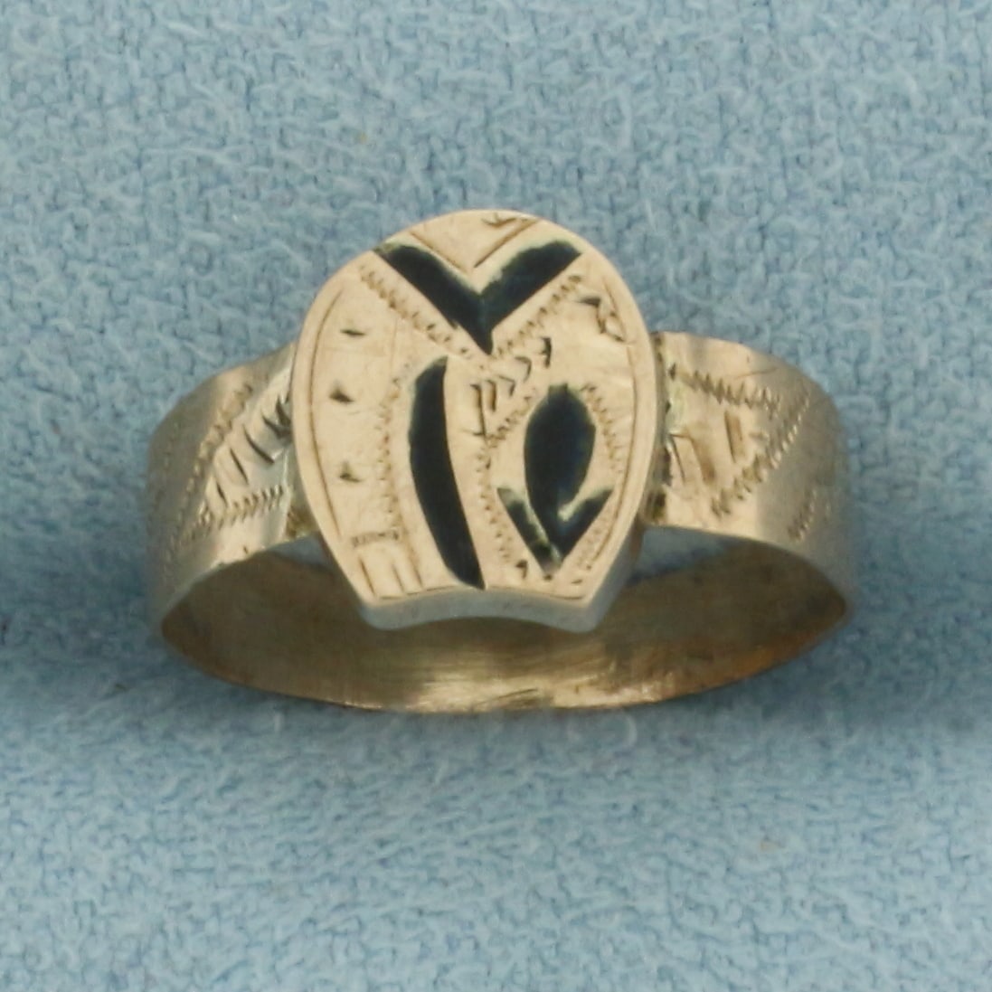Antique Enamel Inlay Child's Ring in 10k Yellow Gold: In 10k yellow gold. 9mm wide at top. Size 3. 1.1g.