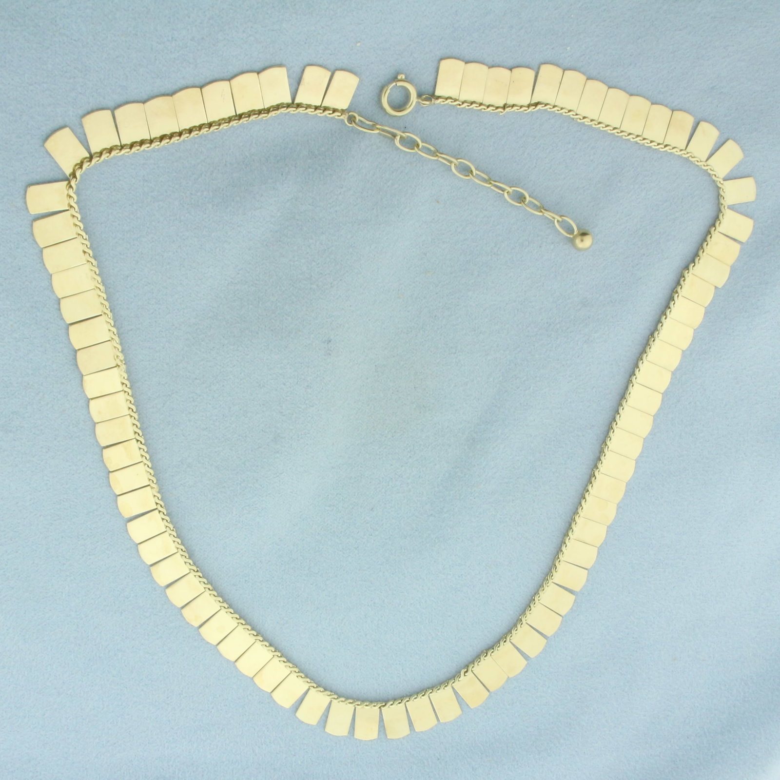 Adjustable Length Cleopatra Necklace in 14K Yellow Gold: In 14k yellow gold. Adjustable from 16 inches to 17 5/8 inches long, 3/8 inch wide. With spring clasp.