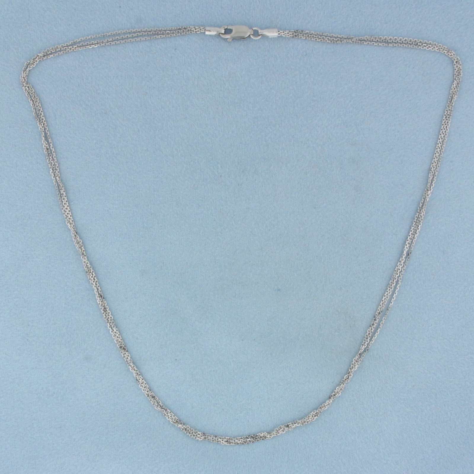 Triple Strand Cable Chain in 18K White Gold: In 18k white gold. 16 1/2 inches long by 3mm wide. Lobster clasp. 4.8g.