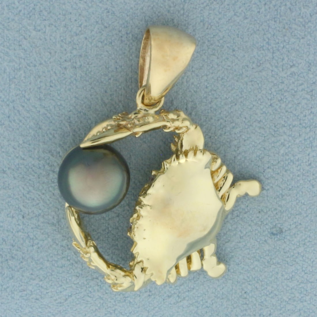 Tahitian Pearl 3D Crab Pendant in 14k Yellow Gold: In 14k yellow gold. 1 3/8 inches long (including bail) by 1 inch wide. Contains one high quality 9mm Tahitian Pearl with high luster. 10.2g.