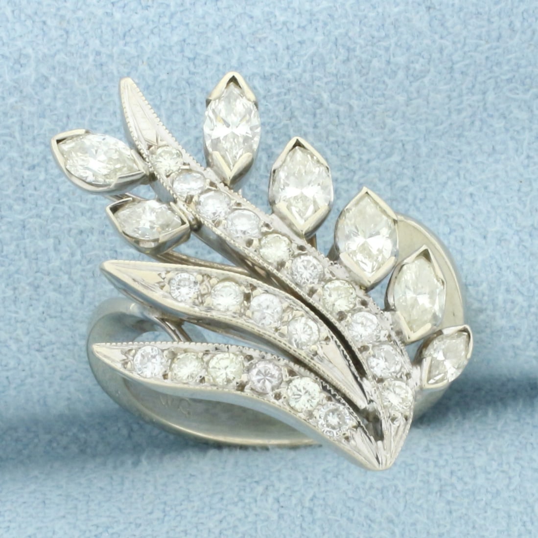 Nature Leaf Design Diamond Ring in 14K White Gold: In 14K White Gold. Contains 7 Marquise and twenty round high quality diamonds, 1ct TW, SI clarity/H color. Size 5 1/2. 6.4g.