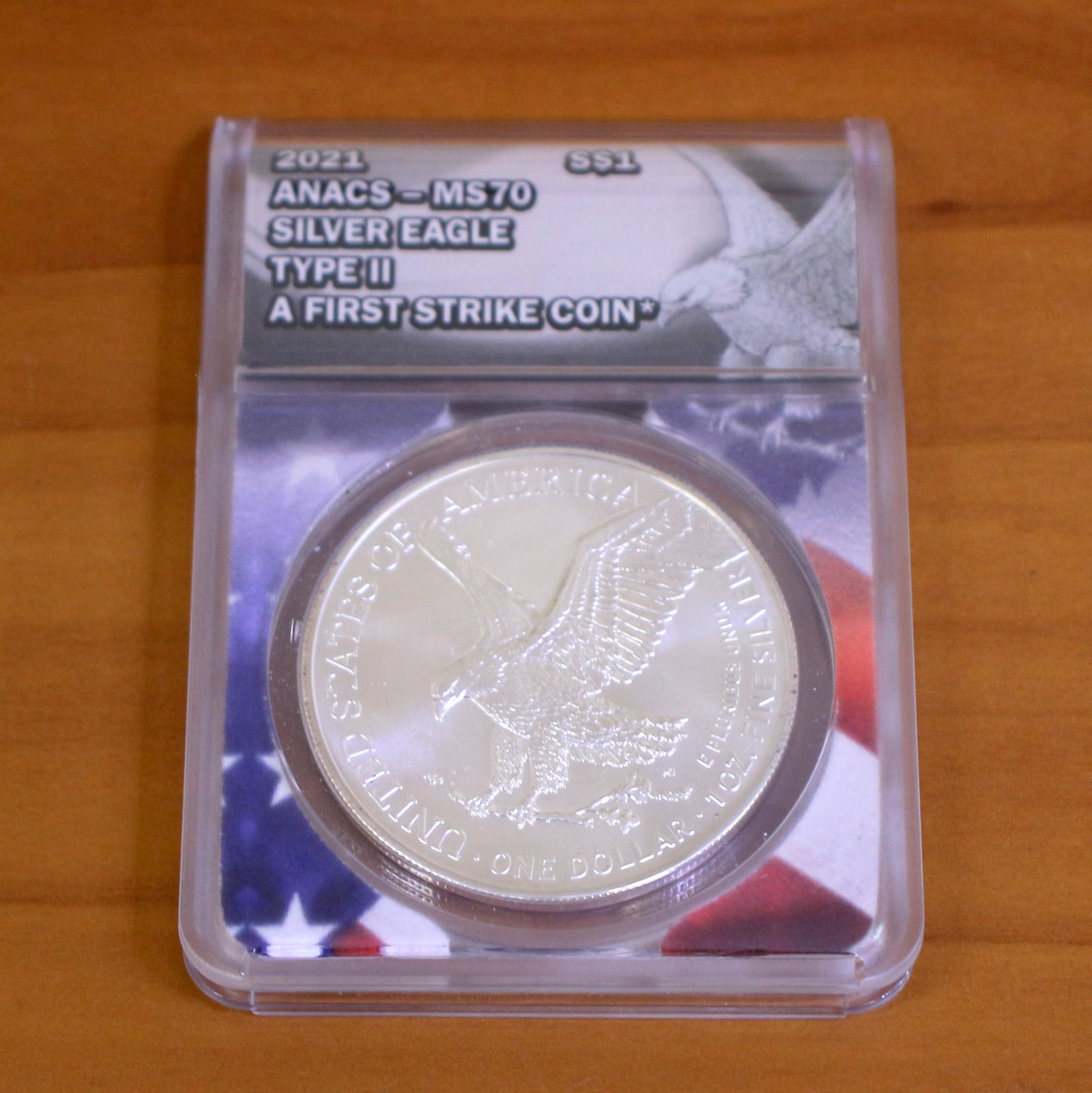 ANACS 2021 MS70 First Strike Silver Eagle Coin: Contains one 2021 ANACS MS70 Type Two First Strike Silver Eagle Dollar. Packaged by ANACS.