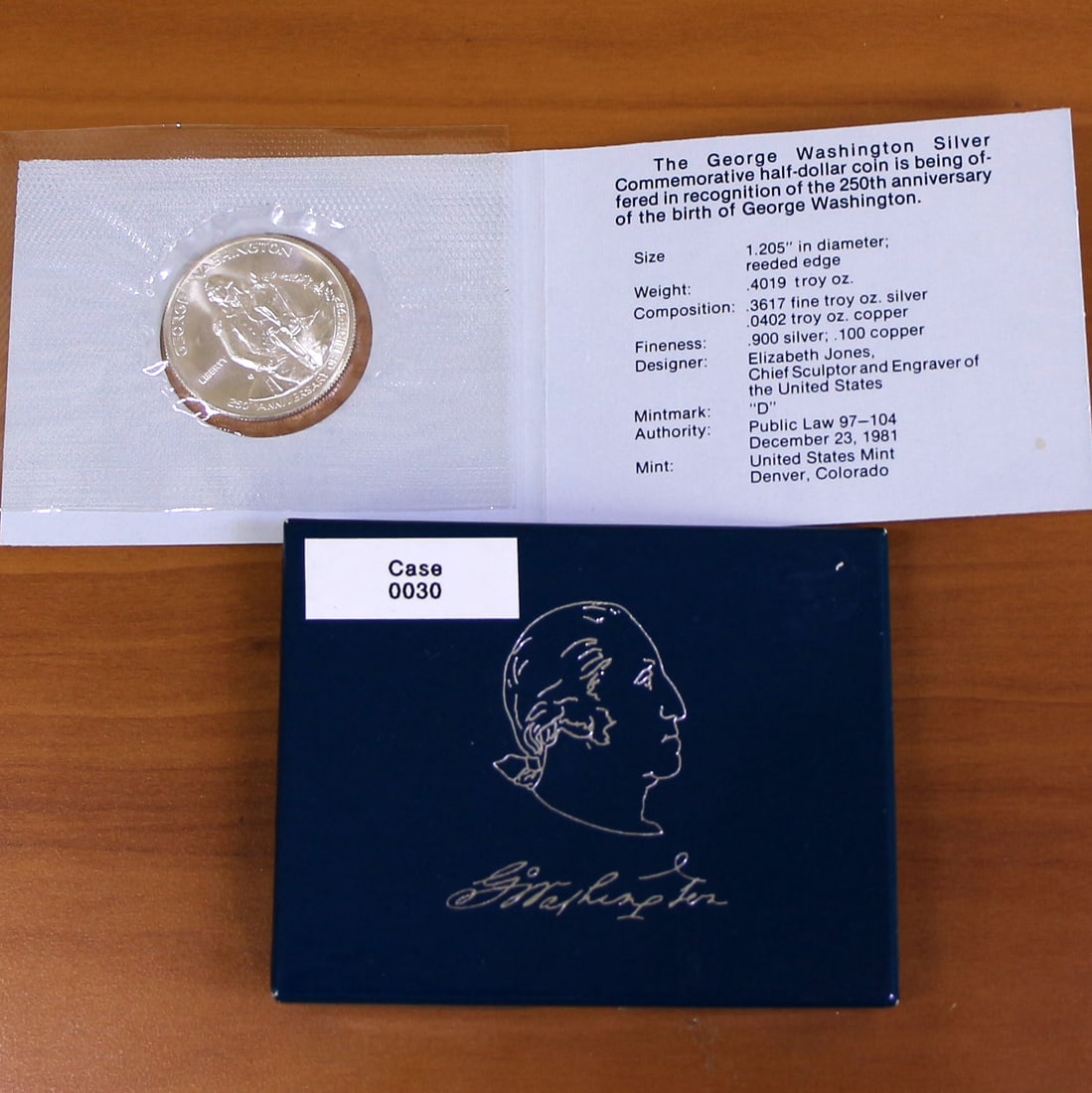 The 1982 George Washington 250th Anniversary Commemorative Half-Dollar Coin Set OGP: Includes original package (OGP) and Certificate of Authenticity. Coin set from the 250th anniversary of the birth of George Washington. Contains: One Uncirculated Silver George Washington Half-Dollar.