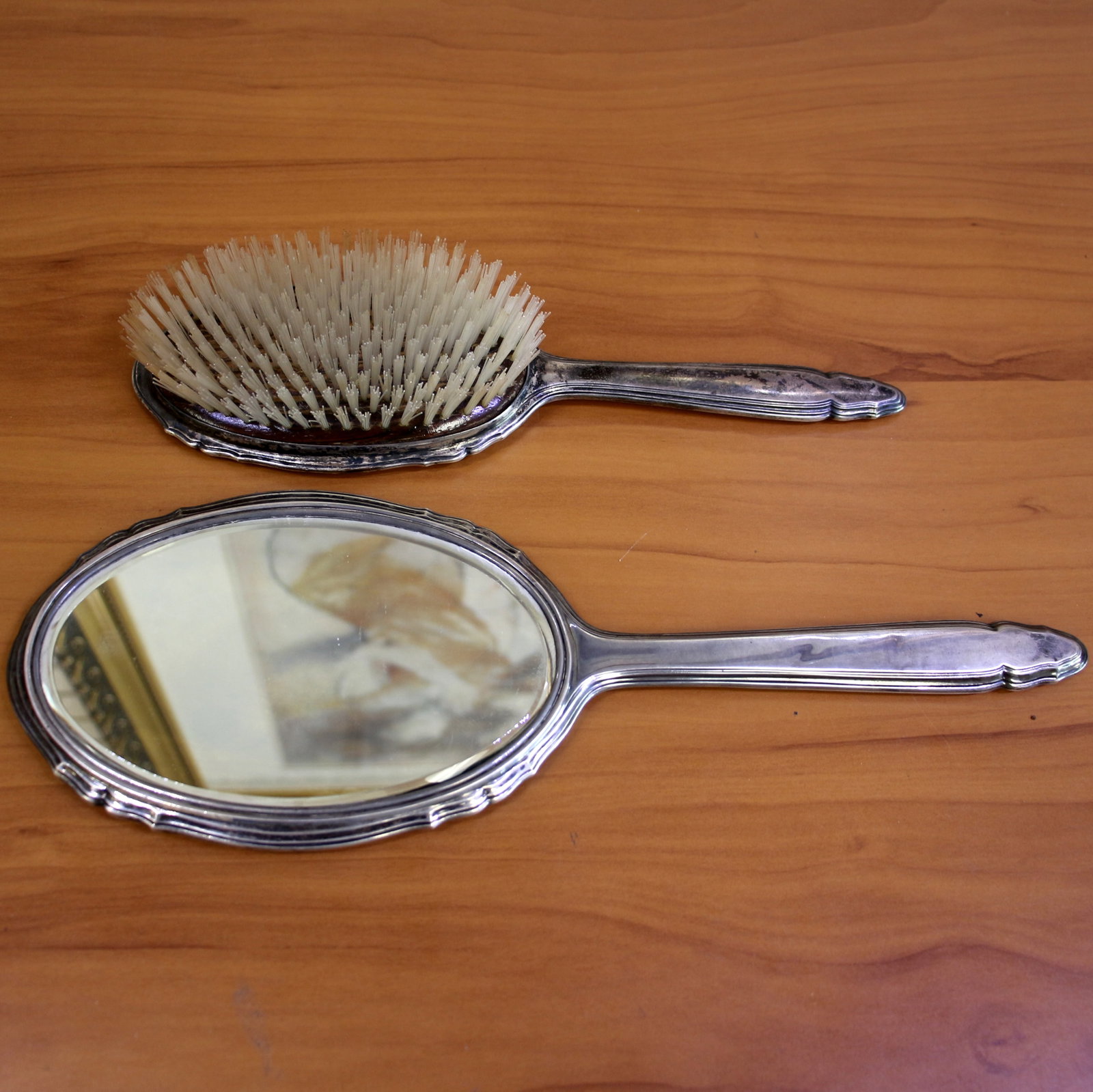 Antique R. Blackinton Sterling Silver Mirror and Brush Vanity Set in Sterling Silver: In .925 Sterling Silver. Mirror is 12.5 inches by 4.25 inches. Hair Brush 10 inches by 3 inches. Antique hand engraved. Great condition for age, very small dent in brush. Monogram on back. 463.2g.