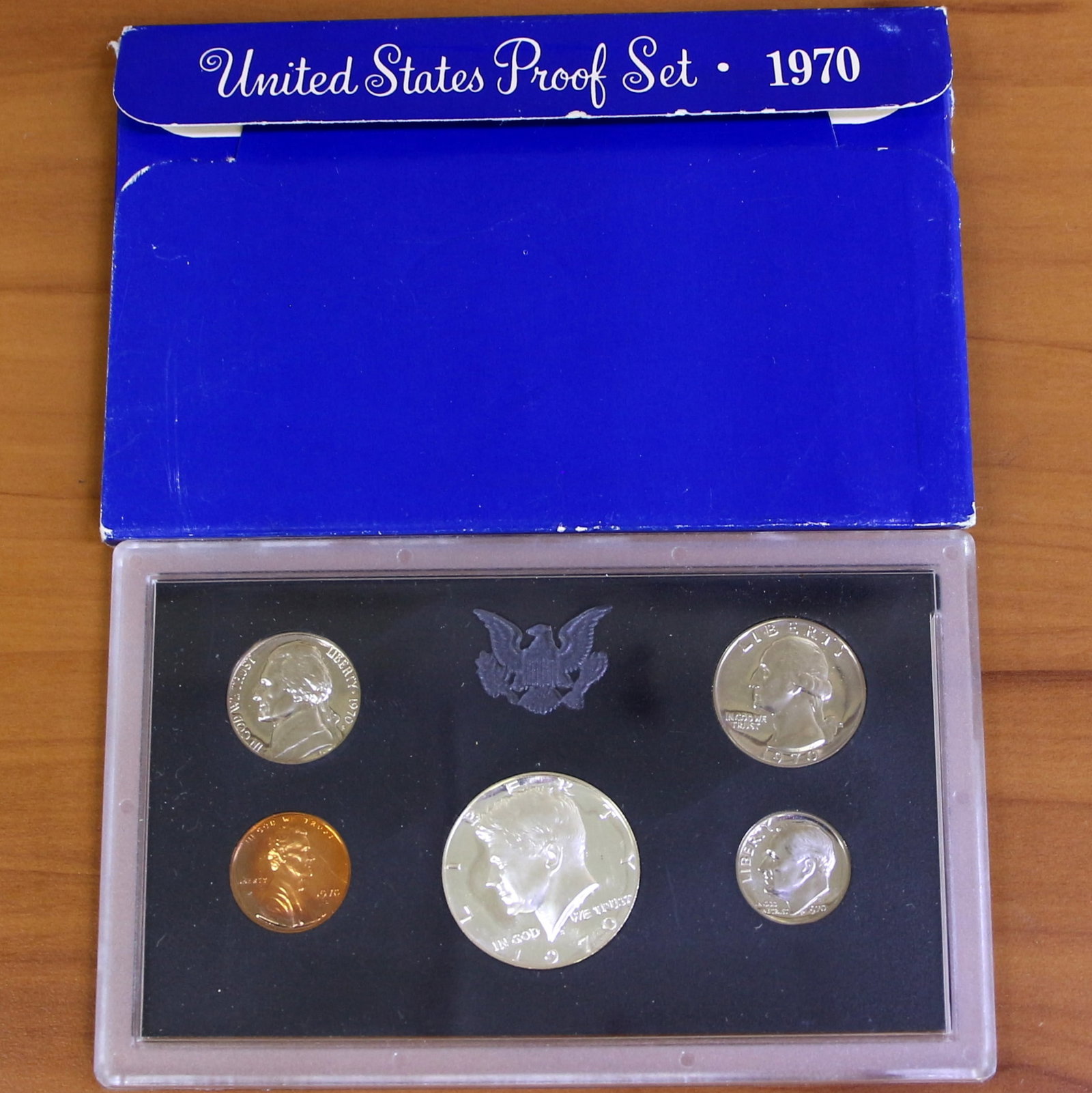 US Mint Proof Coin Set 1968 or 1970 OGP: Includes original package (OGP). One Coin set from 1968 or 1970 includes Silver Kennedy Half dollar, quarter, dime, nickel, and penny.
