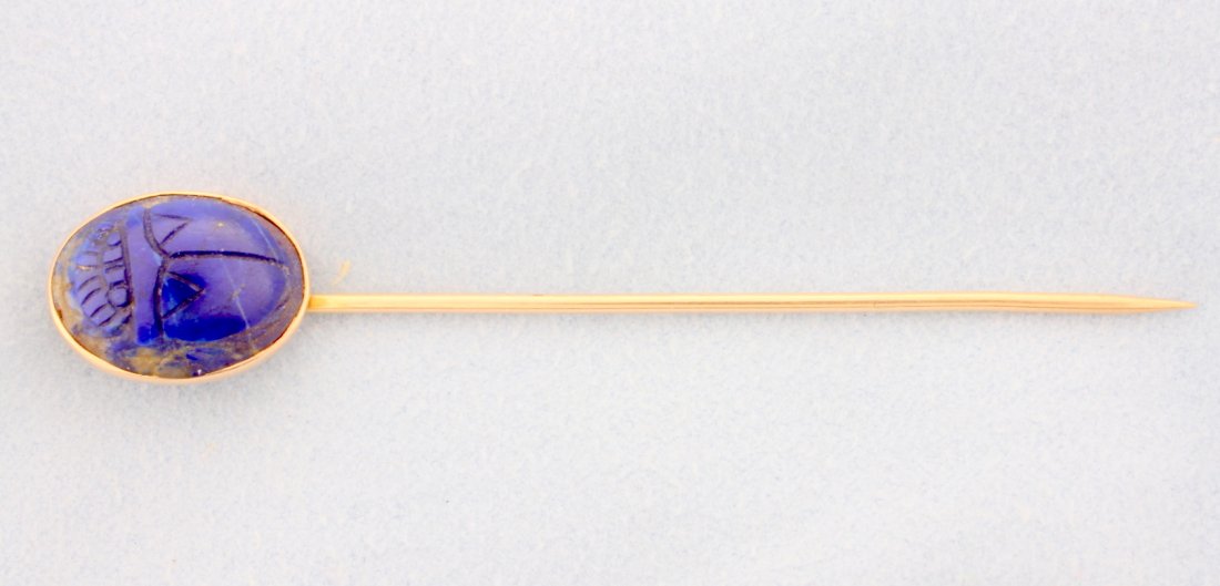 14k yellow gold Antique Scarab Beetle stick pin: 14k yellow gold antique Scarab Beetle Lapis stick pin. Stone is engraved on top and bottom. This piece is very rare. Weight is 2.7g.