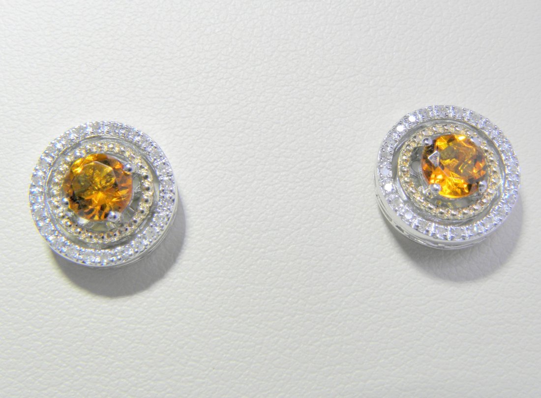 .80CTW Citrine Earrings with Diamonds in 14K Yellow: Beautifully made earrings from front to back with .40ct genuine Citrine in EACH earring. The citrine is surrounded by a 14K yellow gold ring design, with an outer ring of pave Diamonds. Diamonds weigh