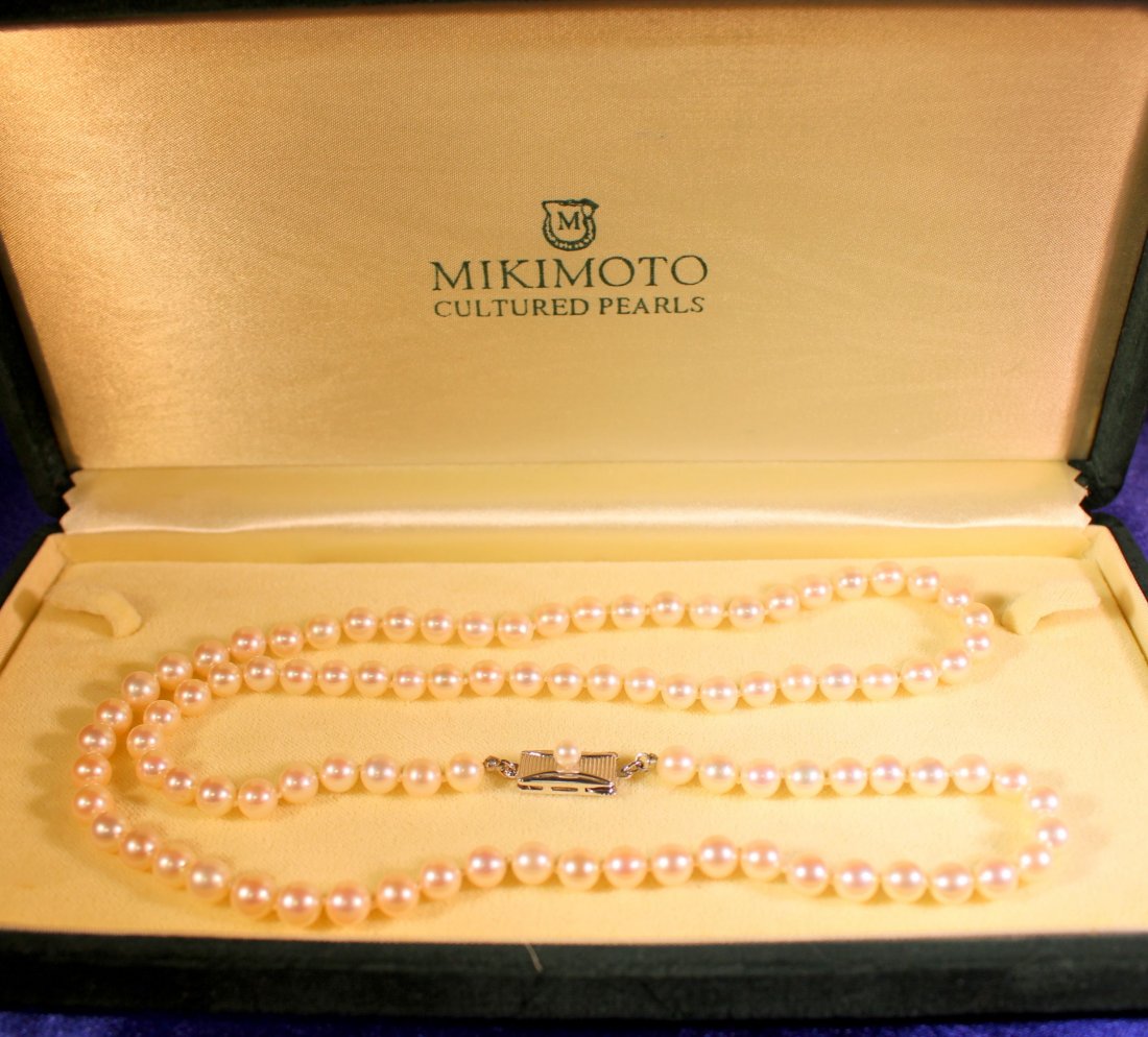 Mikimoto Pearl Necklace with appraisal: Beautiful and classic this ladies cultured Saltwater Pearl necklace by Mikimoto, contains approximately 94 round cultured pearls measuring approx 5.5 - 9.75 mm. The pearls are AA grade, with fine lust