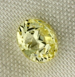 Fancy Yellow Old European Cut .71 carat Diamond: Old European cut, measures 5.61 x 5.55 x 3.64mm, 0.71 carat,VS2 clarity, Fancy Yellow color, EGL USA cert