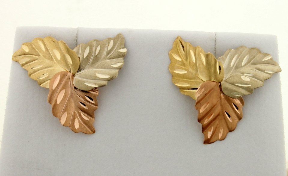 Tri color gold earrings: Pretty 14k tri color gold earrings with three leaves on each ear, each leaf represents gold, white and rose gold. These are for pierced backs. Very pretty! 1.0g