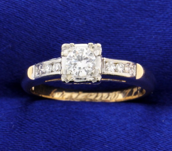 Vintage European Cut diamond ring: Stunning Vintage ring with beautiful European cut 0.30 carat diamond center, VS-1 clarity and H color. There are 4 diamonds, two on each side, at 0.015 carats each, for a total weight of 0.06 carats.