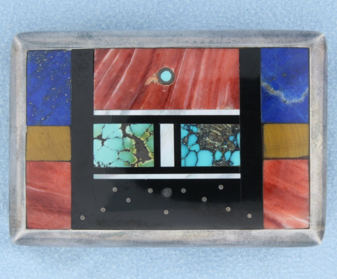 Sterling inlay belt buckle: Beautiful sterling silver inlay belt buckles with Lapis, Turquoise, Onyx, Cats eye and Mother of Pearl. The belt buckle measures 2 1/4 x 1 1/2" and is stamped sterling and signed "Aoyer" 37.9g