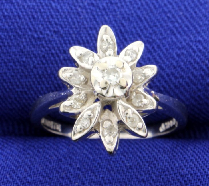 Diamond Star Burst Ring: This stunning 14k white gold star burst ring is covered in 0.18 carats of diamonds! The 11 diamonds are SI clarity and H-I color. The style is very vintage like. Size 6 1/4 4.6g
