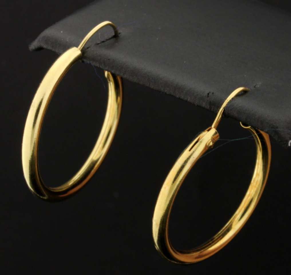 Hoop Earrings: Beautiful and perfect for everyday, these 14k yellow gold hoop earrings are 2mm wide and 3/4" in diameter. 1.7g