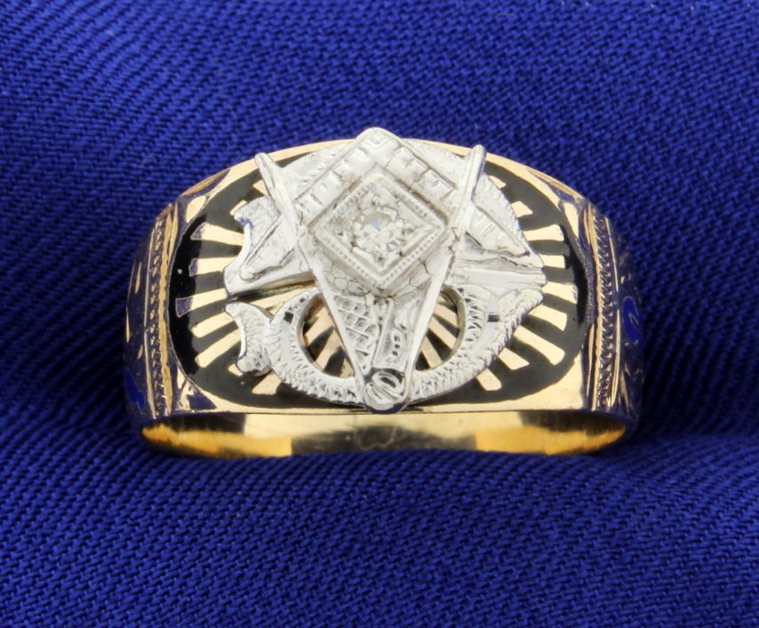 Vintage Masonic Diamond Band: Very handsome and RARE Vintage Masonic Diamond Band set in 10k yellow gold. This ring has one diamond, 0.03 carats, fantastic black and blue enamel work and engraving. The top of this ring is 12mm wid