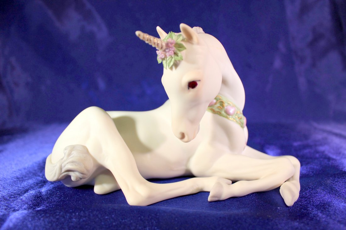 Cybis Porcelain "Unicorn": Cybis Sir Bailey Lying Unicorn Horse Figurine from Fantasia Collection, measuring 4" high and 7 1/2" long, is in perfect condition.