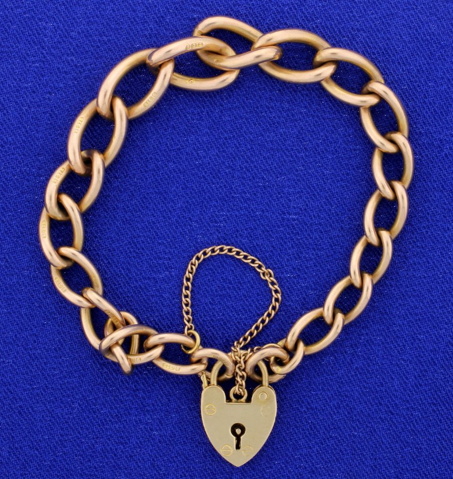 European Rose Gold Vintage Bracelet: European .375 Rose Gold Vintage Bracelet with heart lock. Bracelet is 7" in length and has a small safety chain that may have been added later. 19.3g