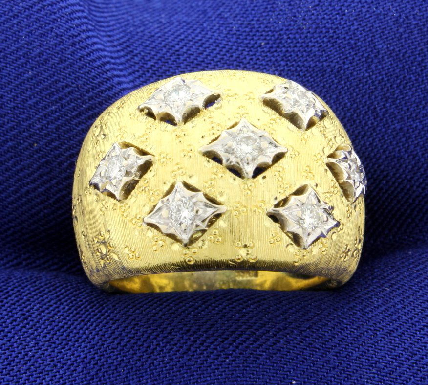 Vintage Italian Made Diamond 18k Band: There are 7 brilliant cut diamonds each set in its own 14k white gold plate. The diamonds are brilliant cut, VS clarity, G color and weigh approx. 0.25cts (1/4 carat). There is a hand engraved design