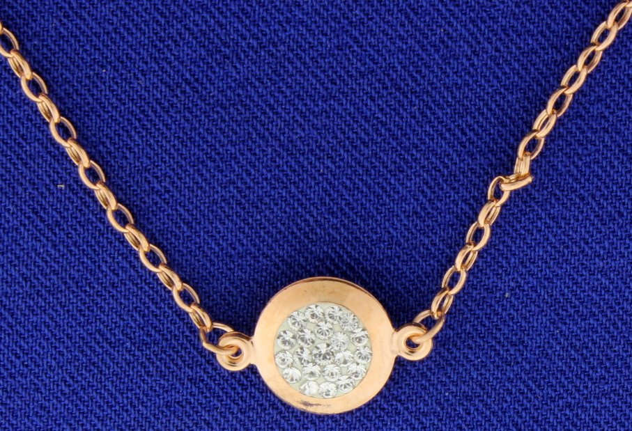 Swarovski Rose gold plated necklace: Darling Swarovski Rose gold plated sterling silver choker style necklace with beautiful white crystals. Necklace measures approximately 17" long. Great style! 1.7g